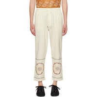 HARAGO 오프화이트 Off-White Embroidered Trousers 242245M191004